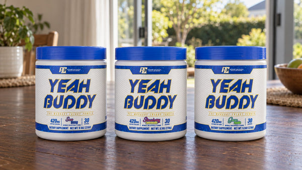 Ronnie Coleman Yeah Buddy pre-workout tub and Creatine Adventure bottle side by side