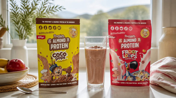 Macro Mike Kellogg's Coco Pops and Froot Loops protein bags on a breakfast bench with a chocolate shake