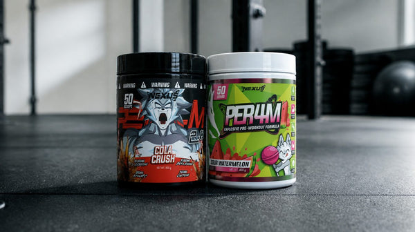 Nexus PER4M and PER4M 2.0 pre-workout tubs side by side on a gym floor with chalk dust
