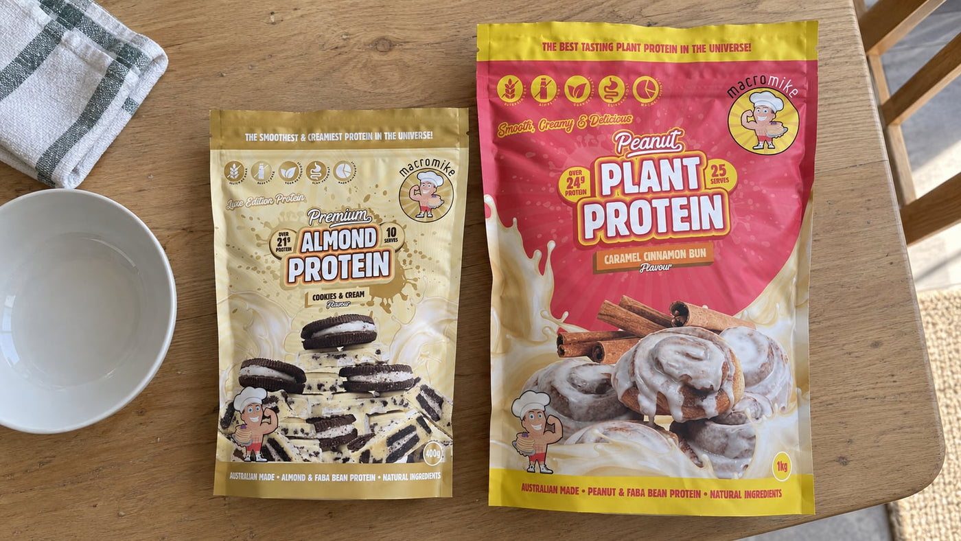 Macro Mike Almond Cookies and Cream and Peanut Caramel Cinnamon Bun bags side by side on a table
