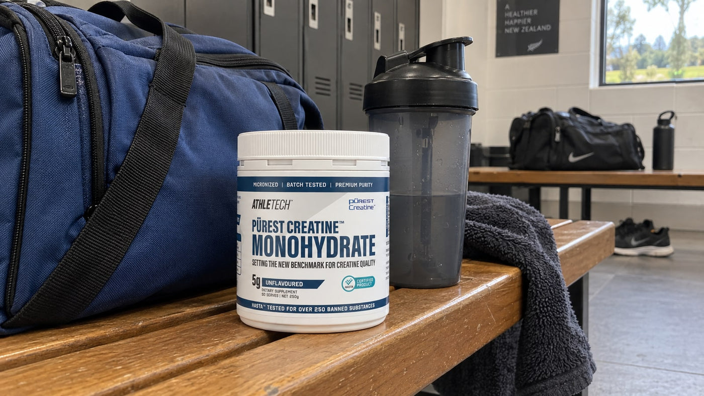 Closed Athletech Purest Creatine Monohydrate beside an individual gym bag and shaker.