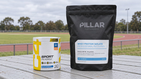Cellucor C4 Sport Blue Raspberry and Pillar Vanilla Whey Protein Isolate beside a running track.
